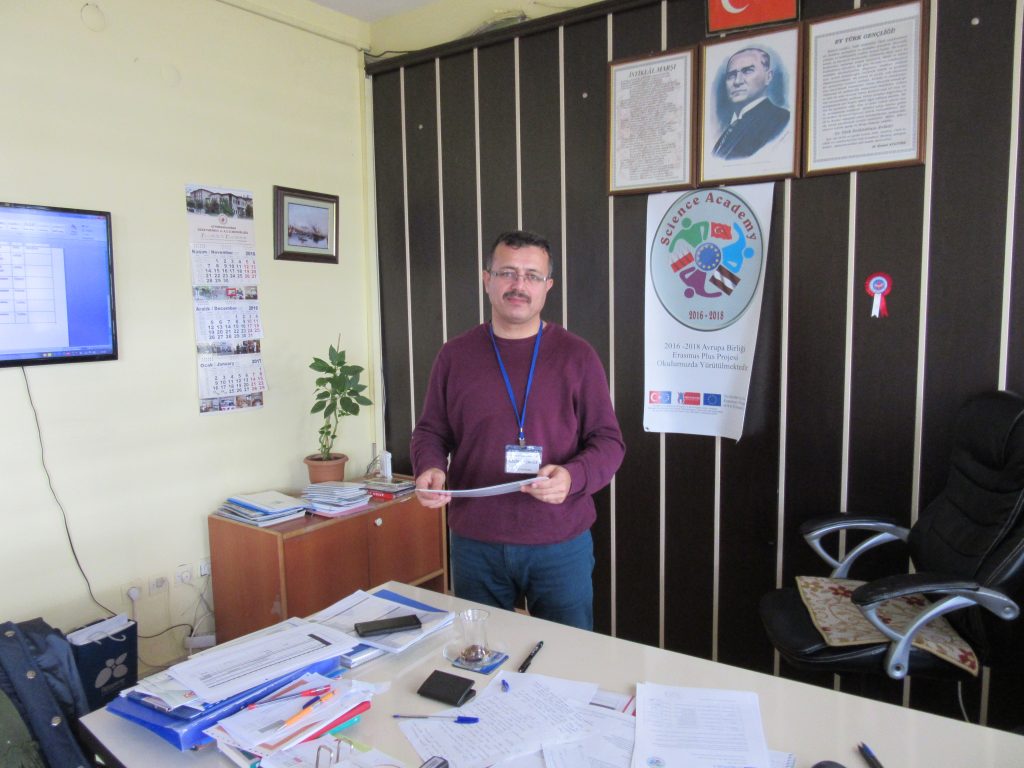 67. Ali Çetinkaya Ortaokulu school’s headmaster with the certificates